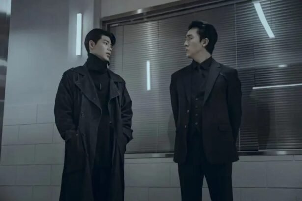 Two males standing face-to-face in a scene of gyeongseong creature Season 2 E3